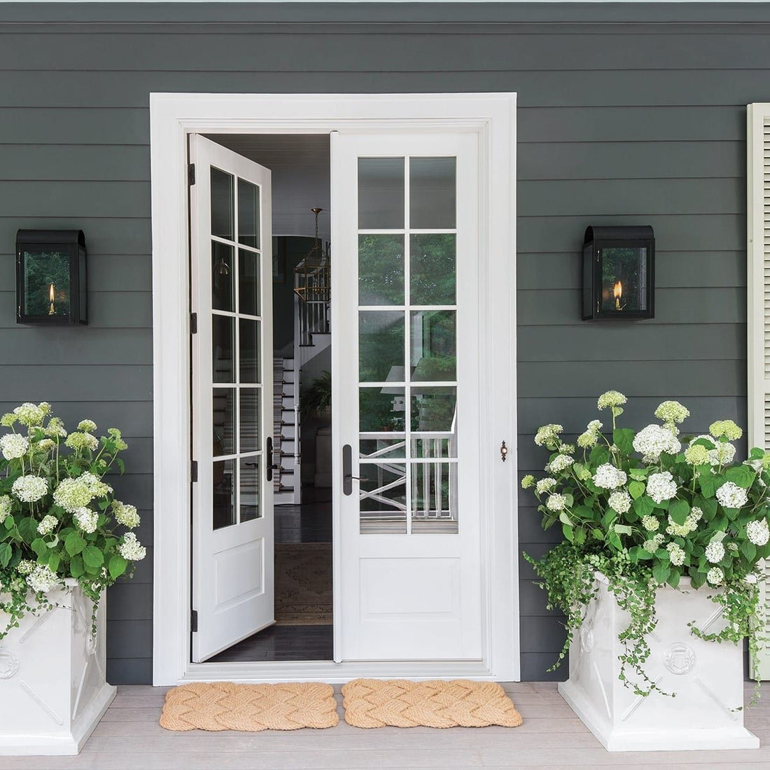 dark green house with white french doors
